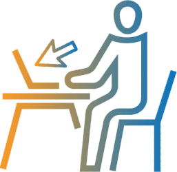 A Man Sitting Front of Computer on Work Table